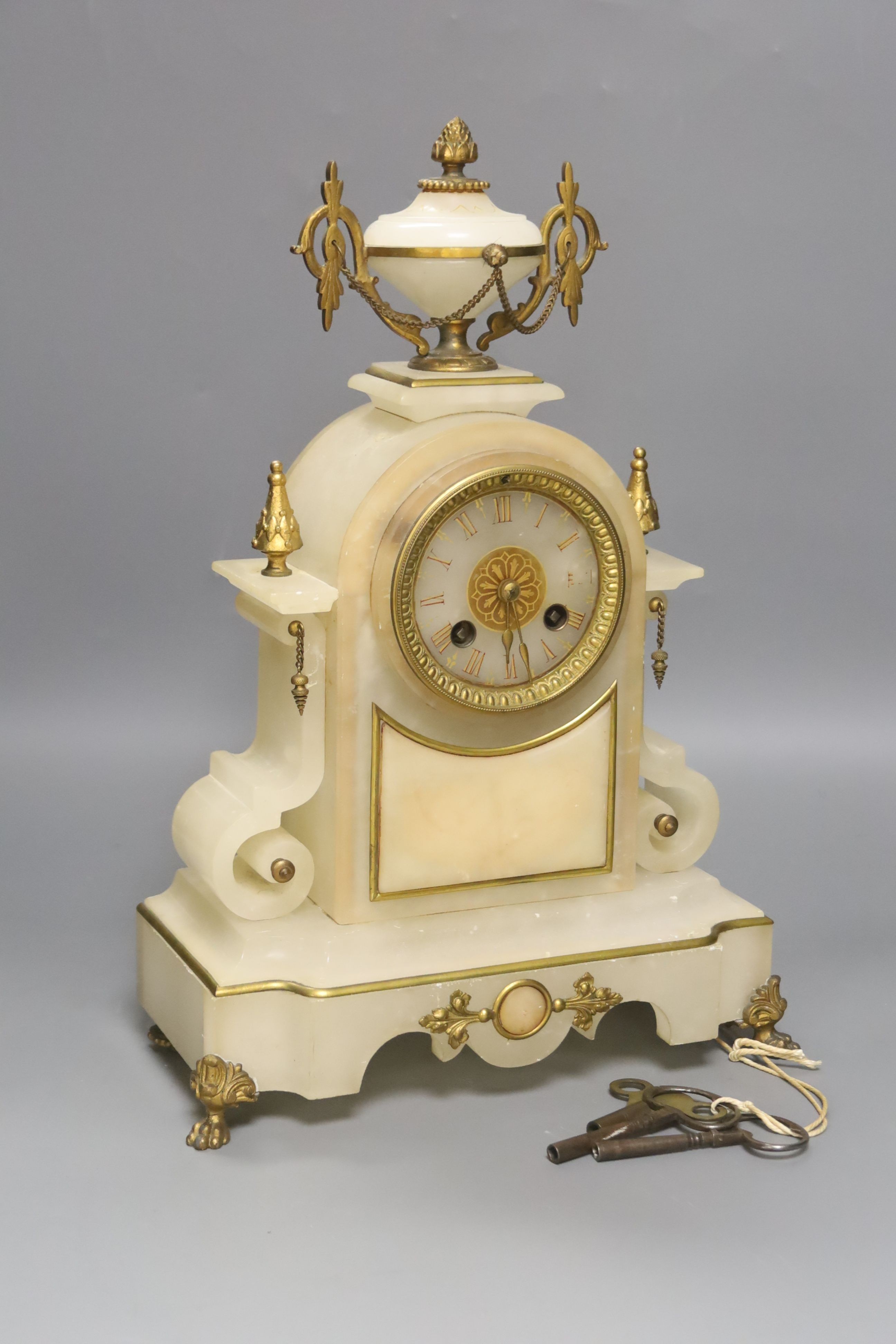 A French alabaster and gilt metal mounted mantel clock, 36.5cm